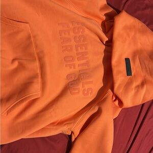Fear of God Essentials Orange Hoodie